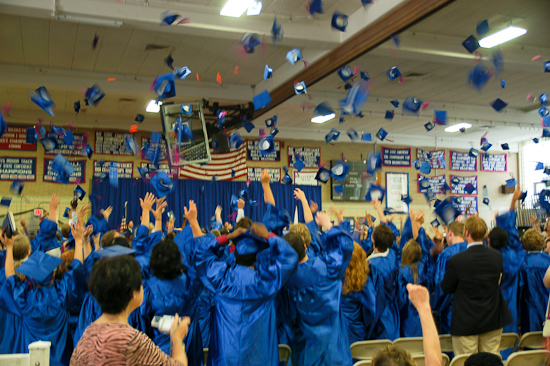 Caps in the air!