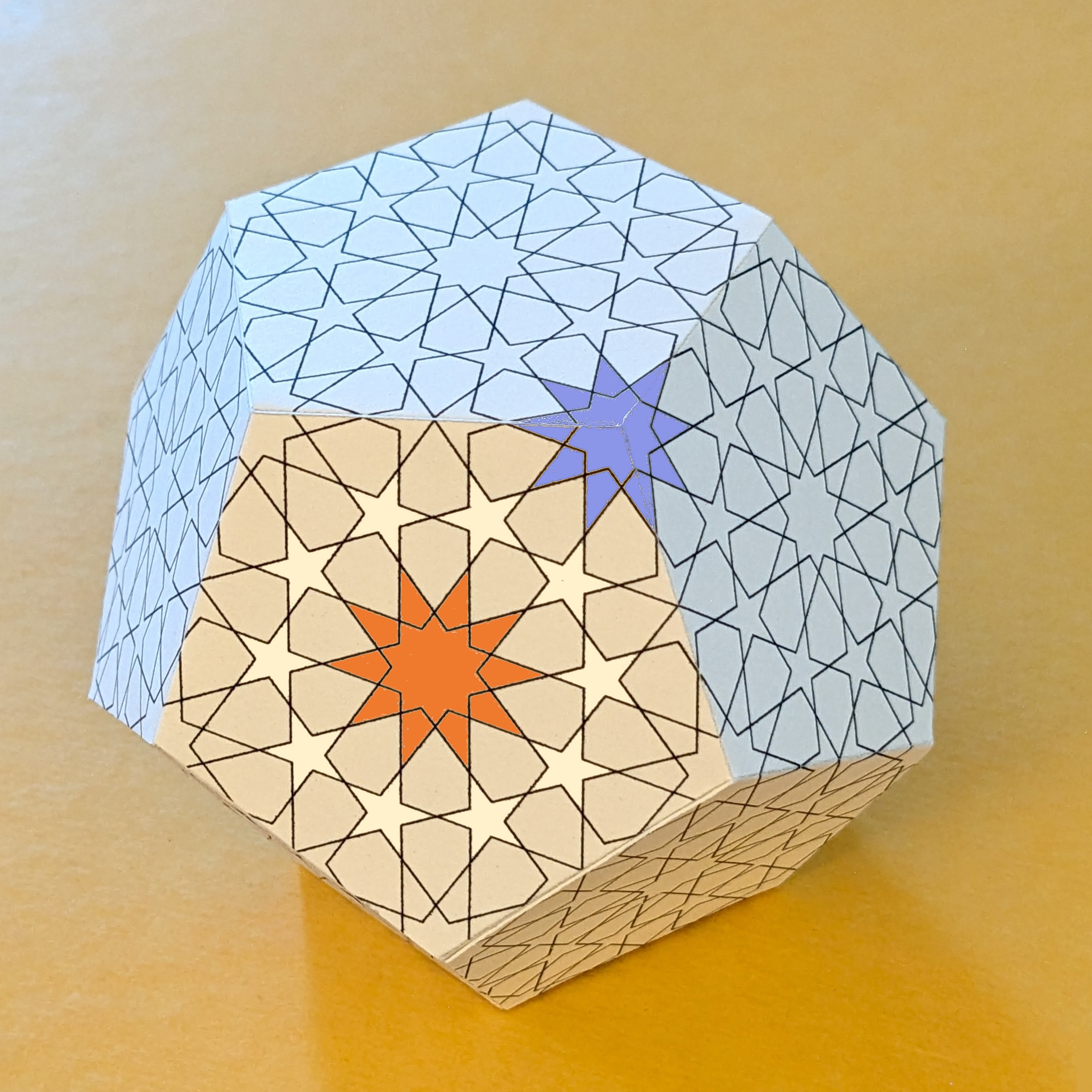 The dodecahedron with some regions of the pattern highlighted in colors