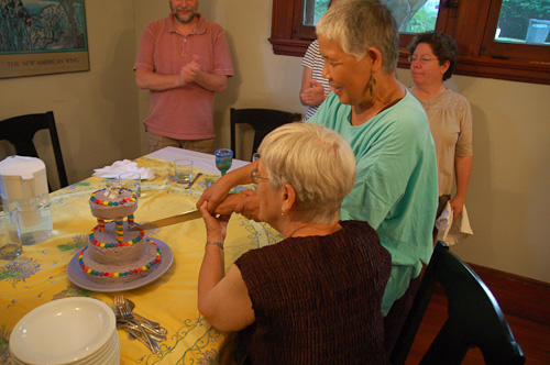 Mom and Fumiko cutting the wedding cake