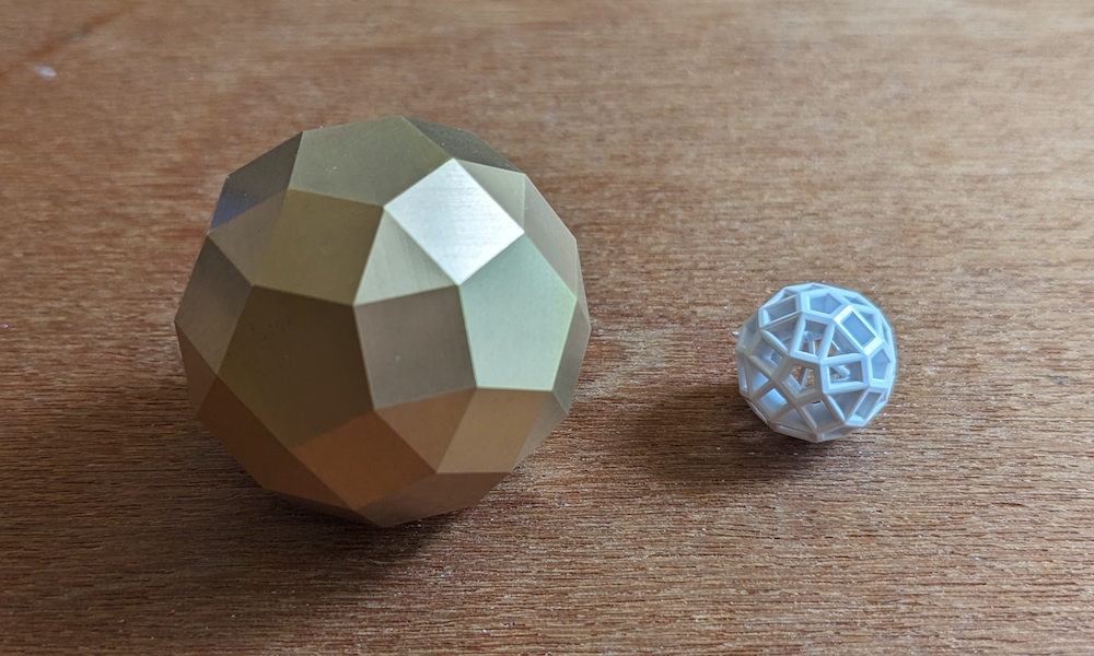 Two rhombicosidodecahedral toys: Glint and Zome