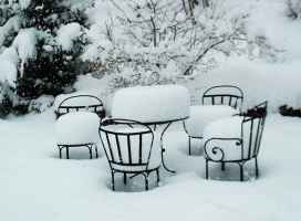 Snow on table and chairs