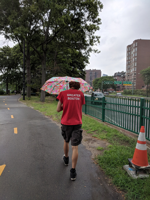 Nat, walking in the rain